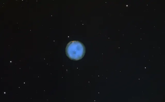 Nebuloasa planetară M97, cunoscută drept Nebuloasa Bufniței